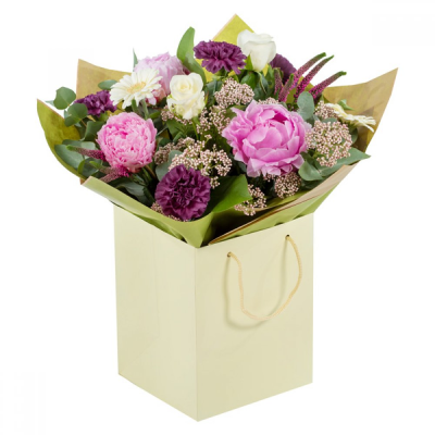 Country Whispers - A sweetly scented hand-tied featuring Peonies with a fine company of beautifully selected flowers. Make their day with a one-of-a-kind arrangement that promises to deliver.    
